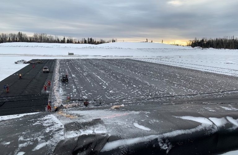 Winter installation of geosynthetics with layer completion each day1